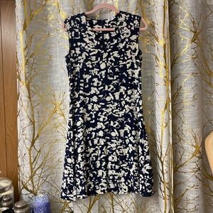 Pretty dress. Vince, size 2. silk,This hits above the knee. Too small for me,new